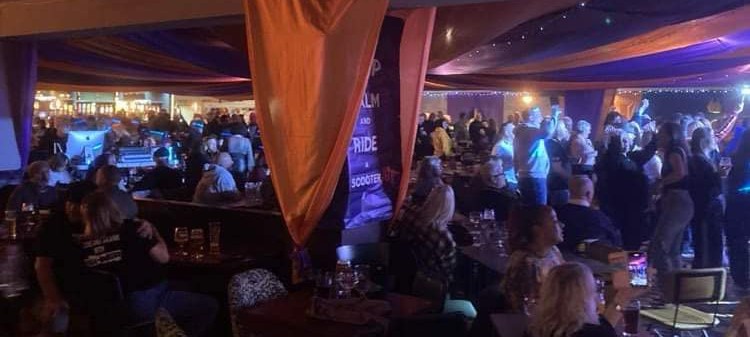 Crowd at Shakedown Winter Scooter Rally inside Harts Holiday Park venue on the Isle of Sheppey